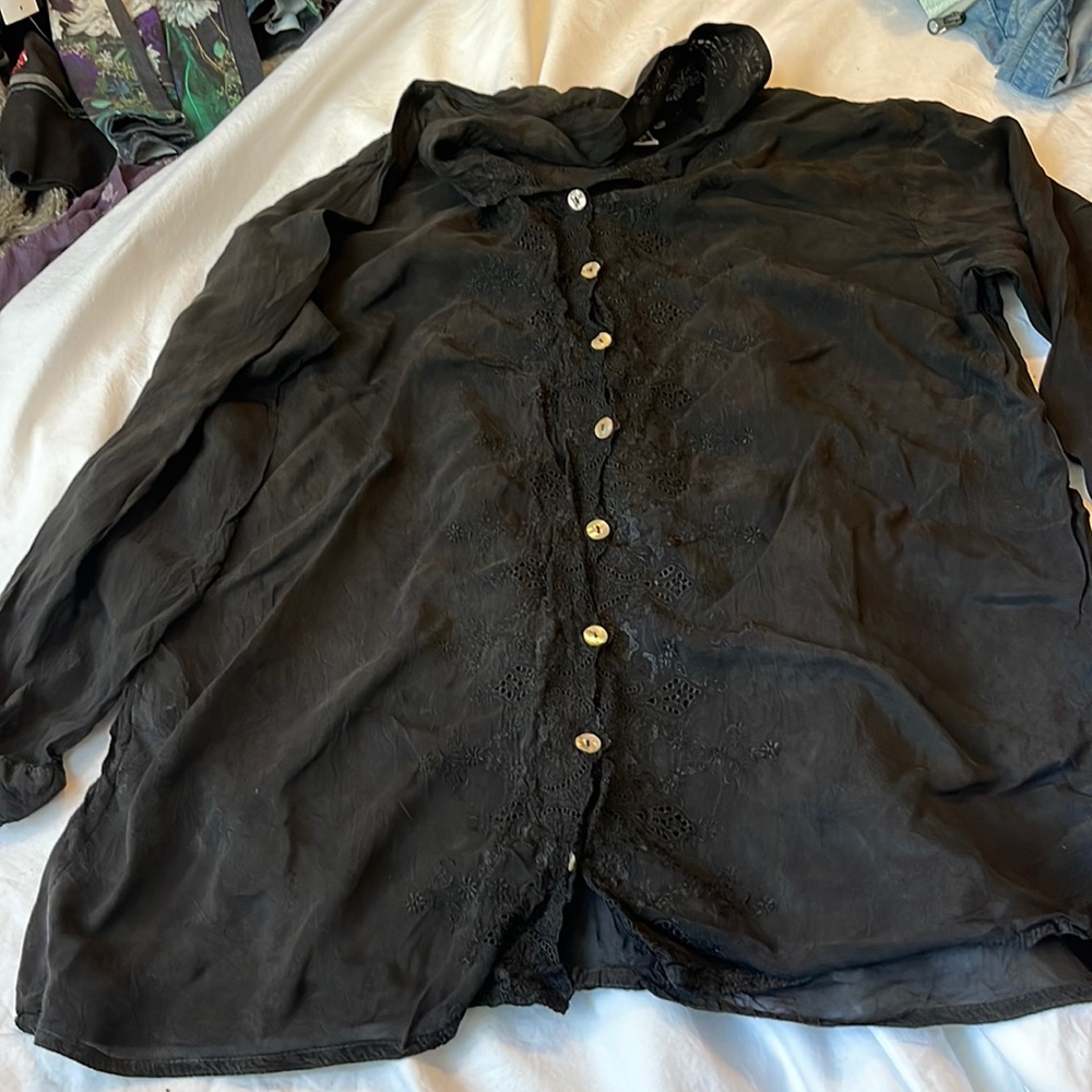 Johnny was size L black shirt with pearl buttons